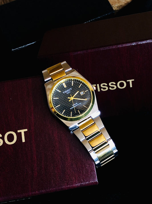 Tissot Prx two tone golden and silver with black dial